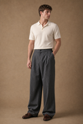 Acentino Pinstripe Trousers in Charcoal with White Pinstripes on model - front pose