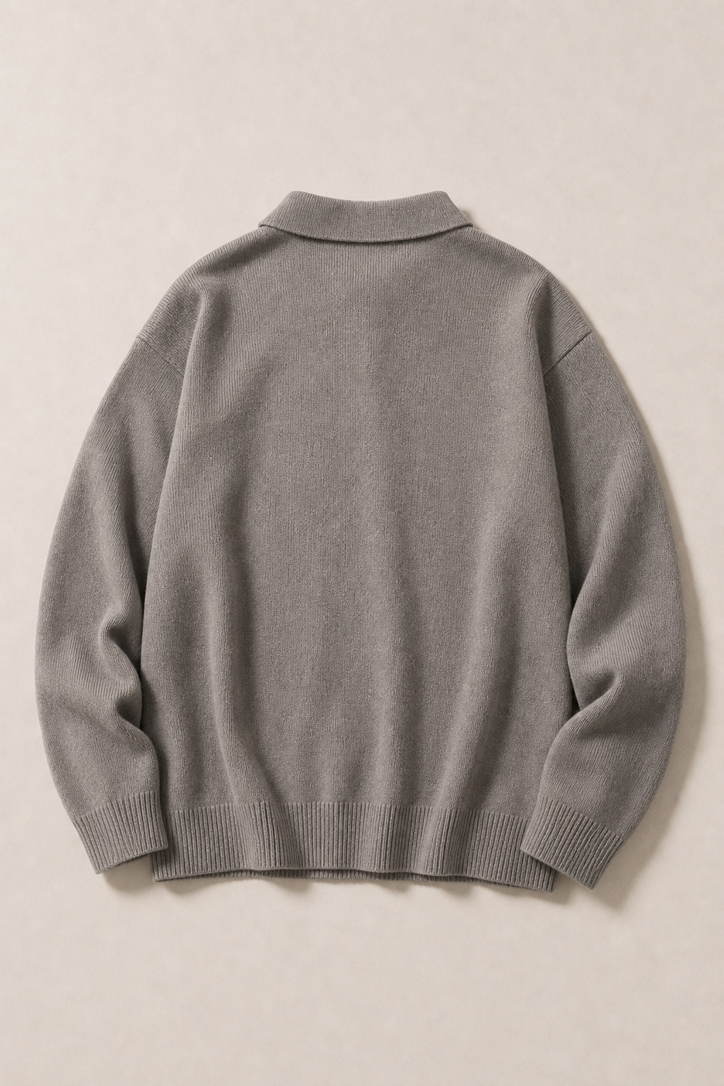 The Acentino Polo Sweater in Taupe — back view