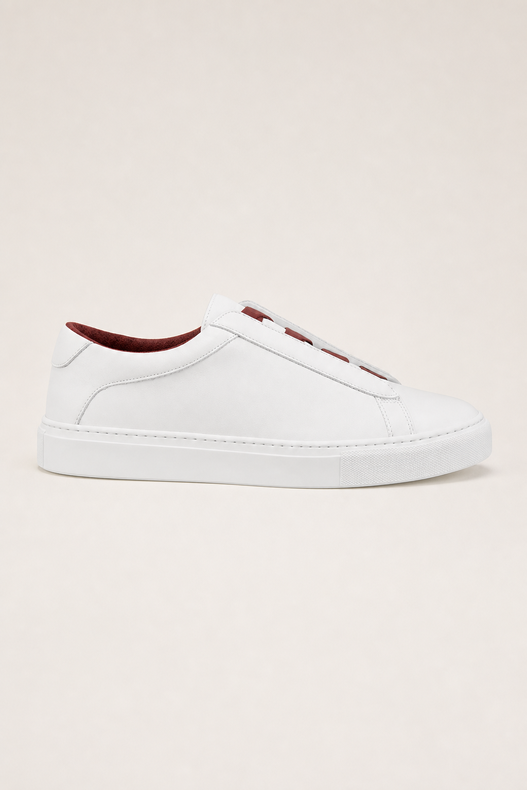 Acentino Leather Sneakers in White - side view