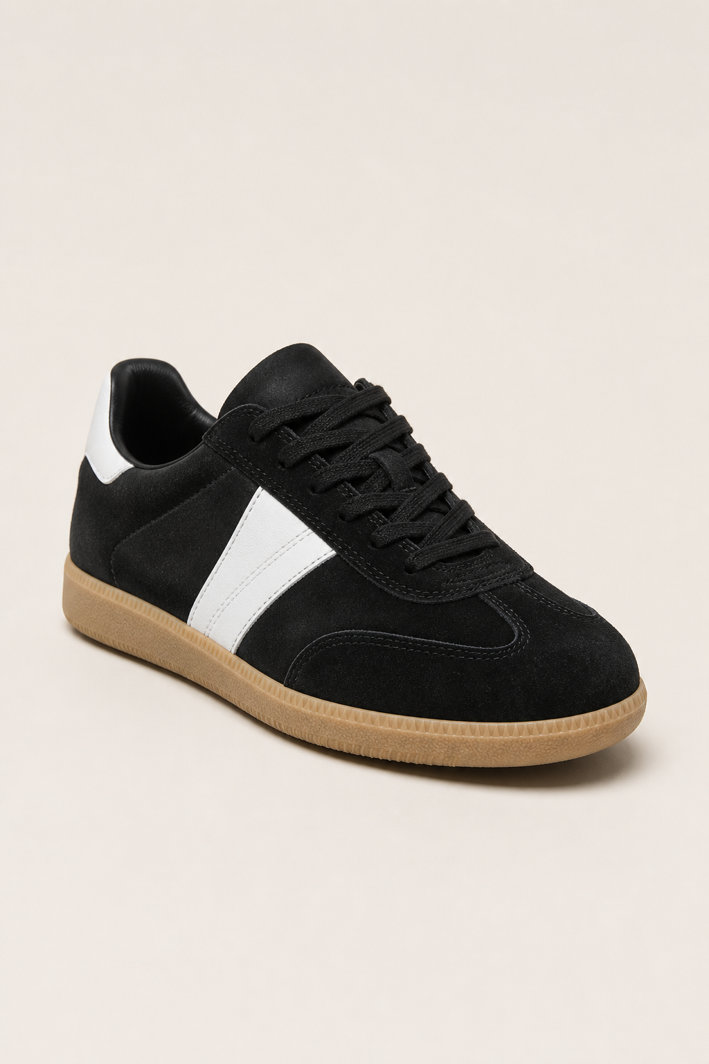 Amalfi Suede Sneakers in Black and White - angle view
