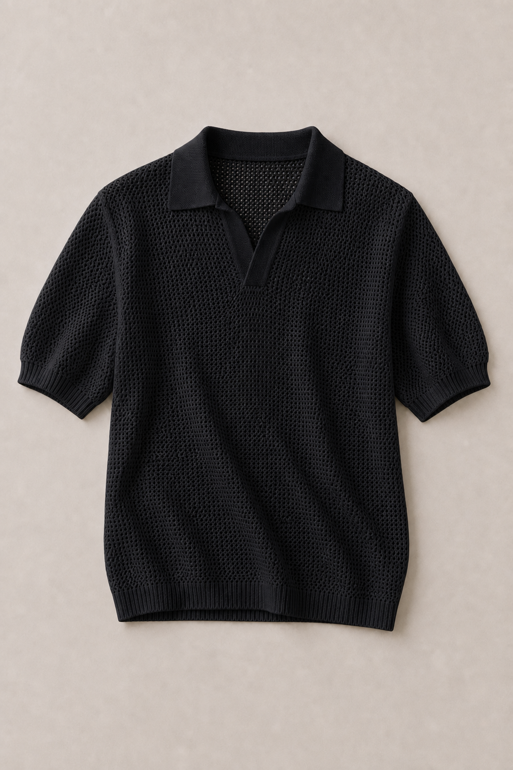 Aria Knitted Polo Shirt in Black — front view