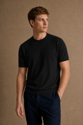 Burano Knitted T-Shirt in Black on model — front pose