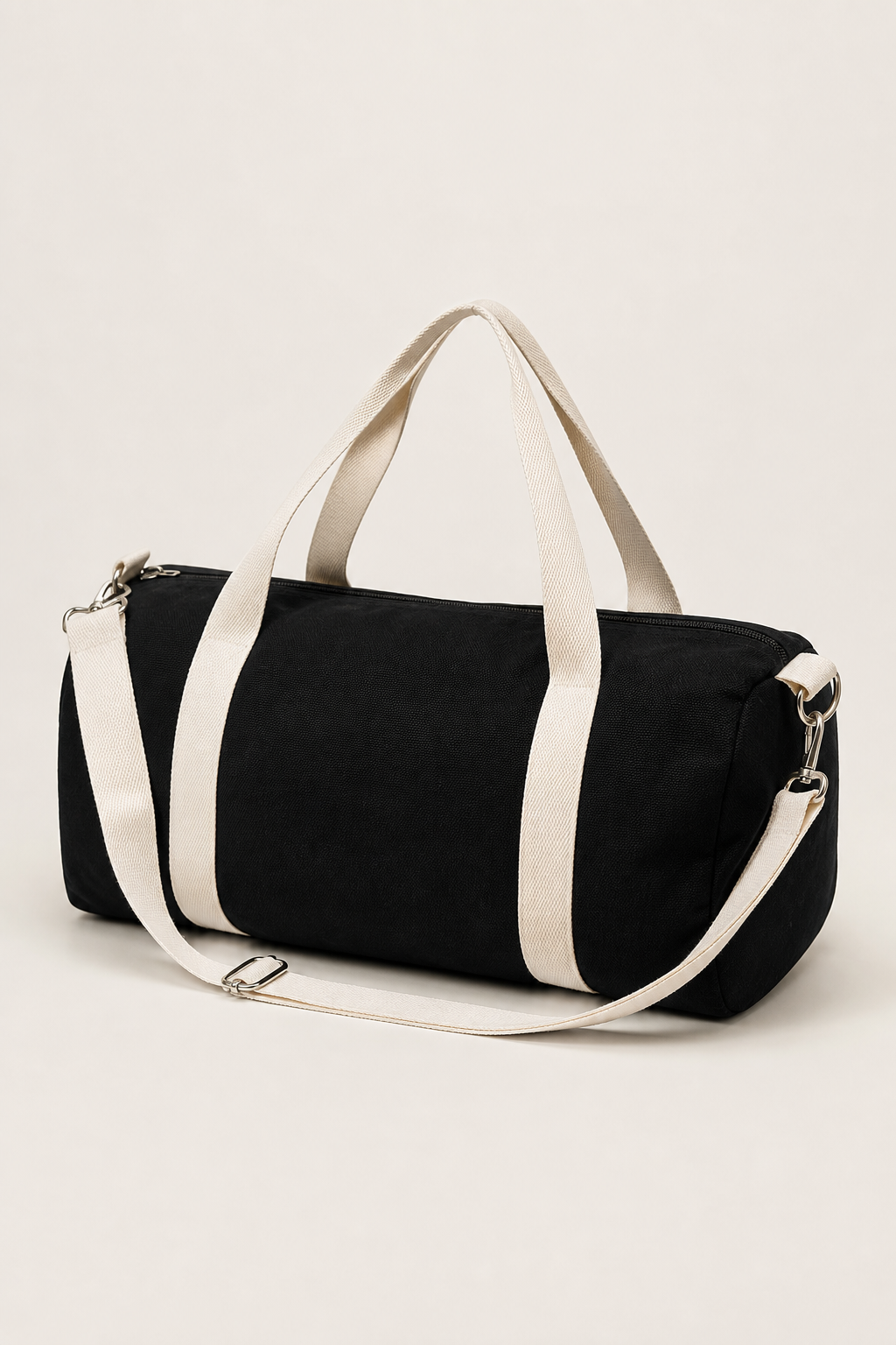 Cassis Barrel Bag in Black - angle view