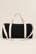 Cassis Barrel Bag in Black - front view