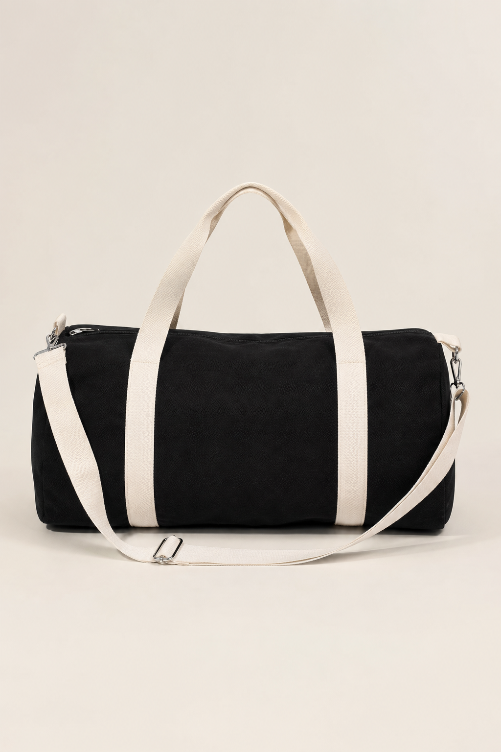 Cassis Barrel Bag in Black - front view