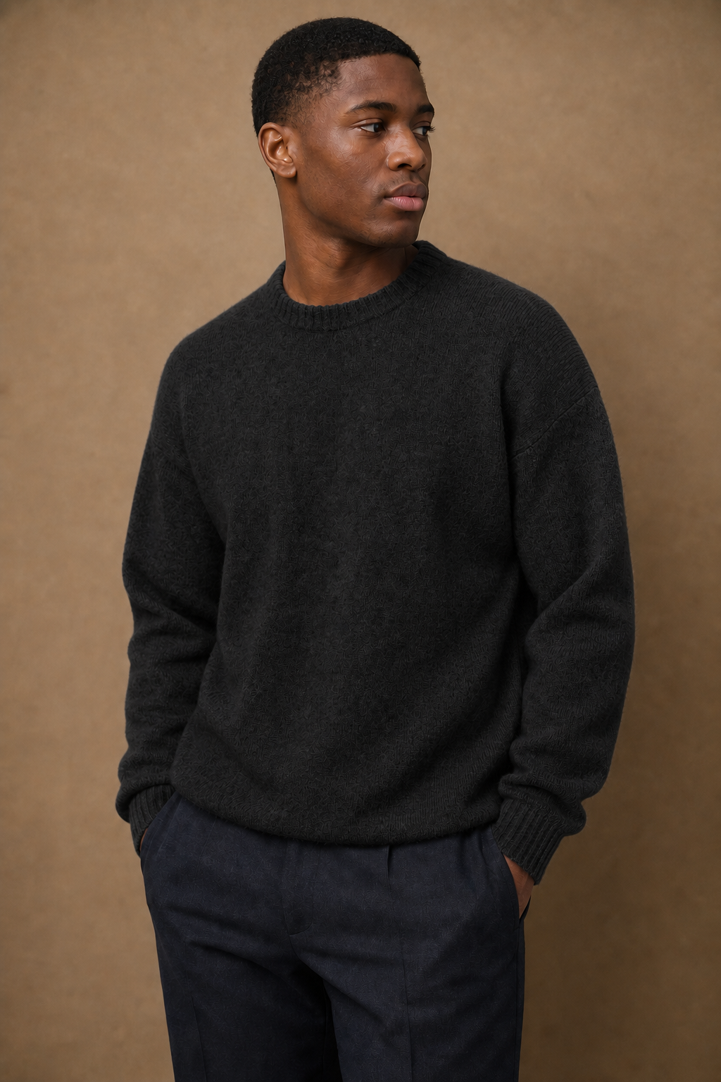 Knit Wool Sweater in Black on model — front pose