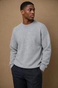 Knit Wool Sweater in Grey on model — front pose