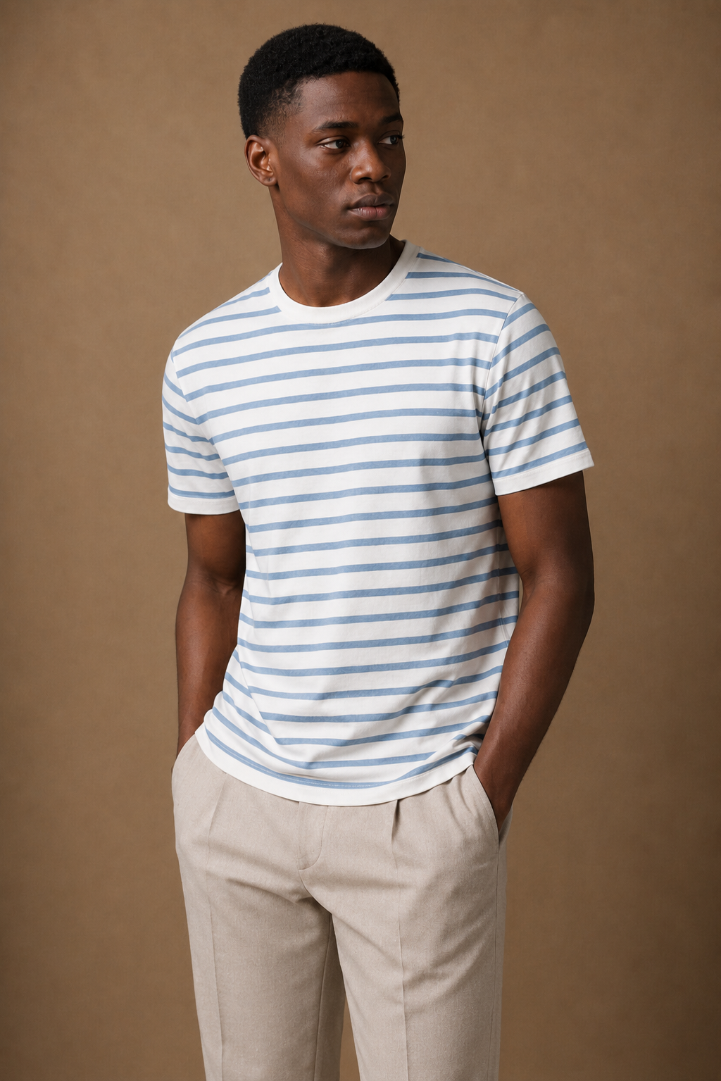 Lido Striped T-Shirt in Cream with Dusty Blue Stripes on model — front pose