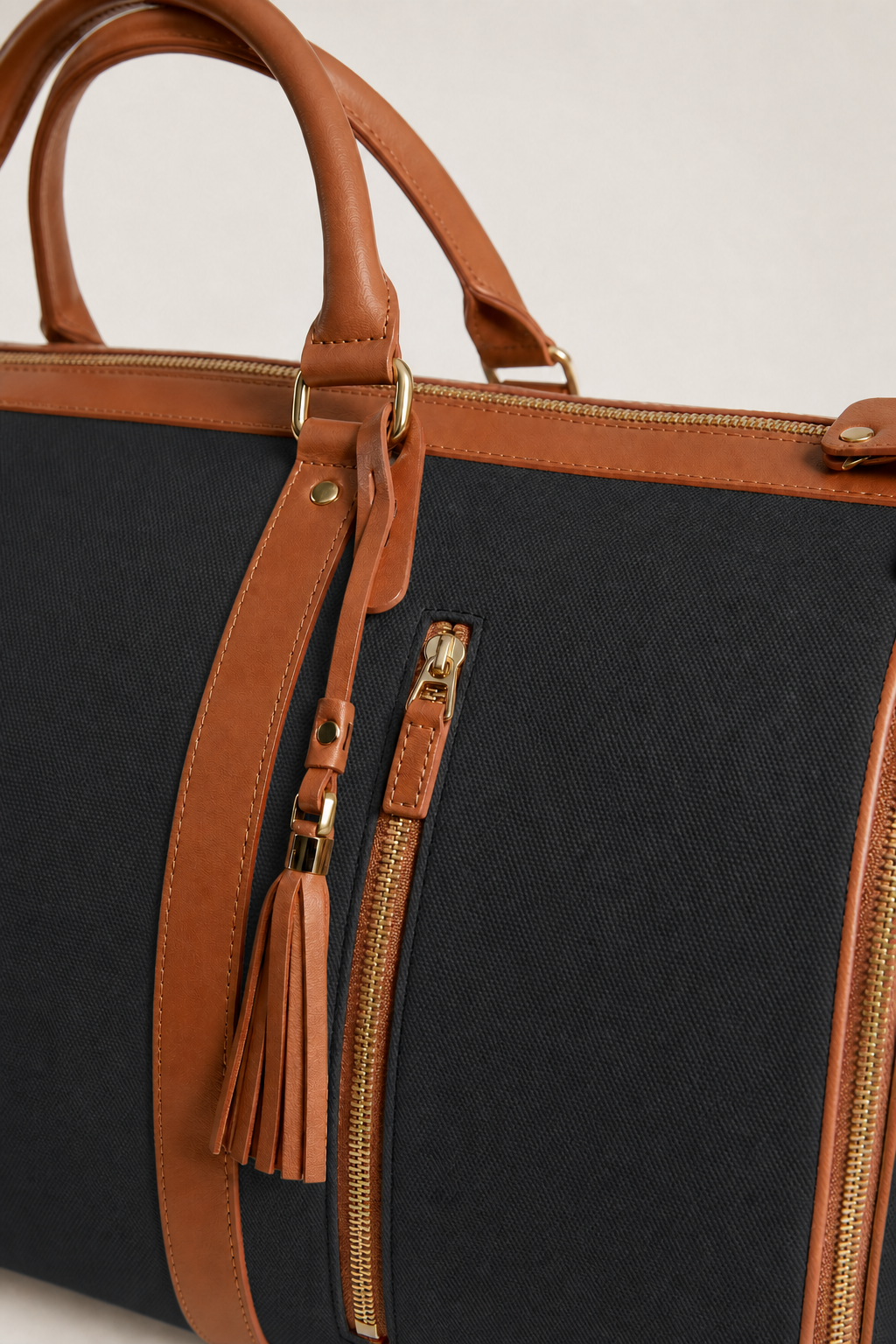 Menorca Weekender Duffle Bag in Black and Cognac - detail view