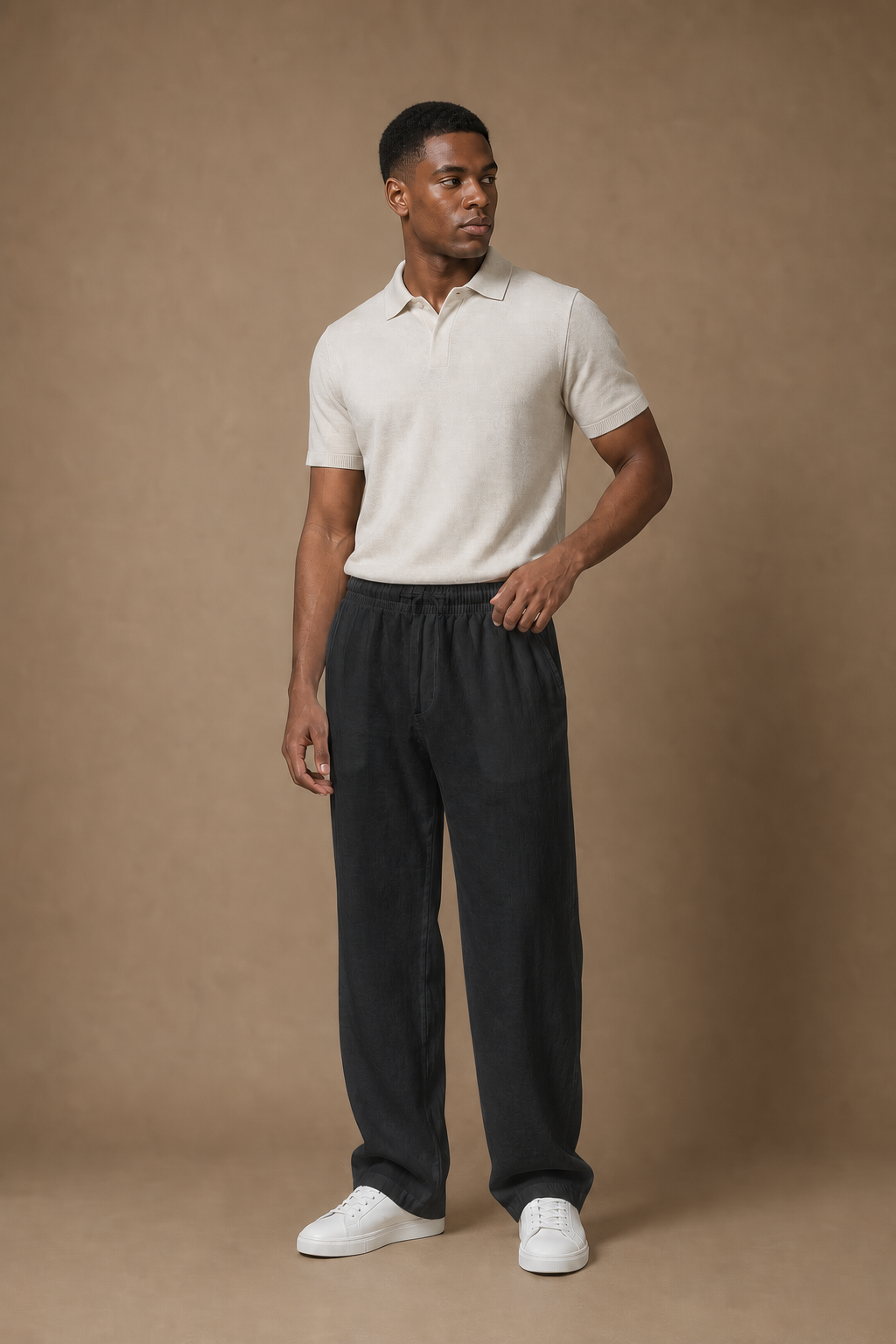Sardegna Linen Trousers in Charcoal on model - front pose