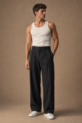 Stromboli Pinstripe Trousers in Charcoal with White Pinstripes on model - front pose