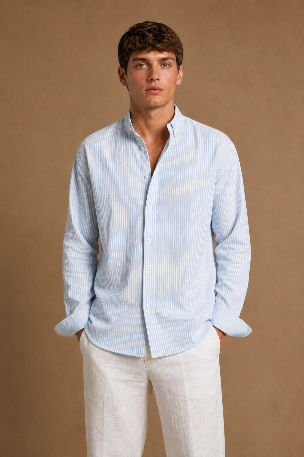 Tabarca Striped Linen Shirt in White with Light Blue Stripes on model - front pose