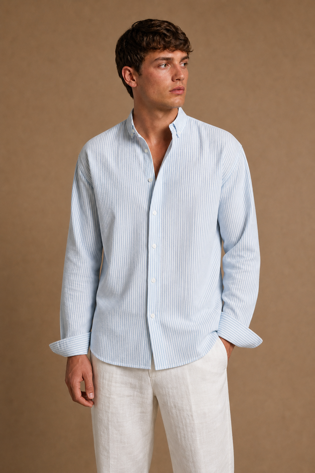 Tabarca Striped Linen Shirt in White with Light Blue Stripes on model - alternate pose