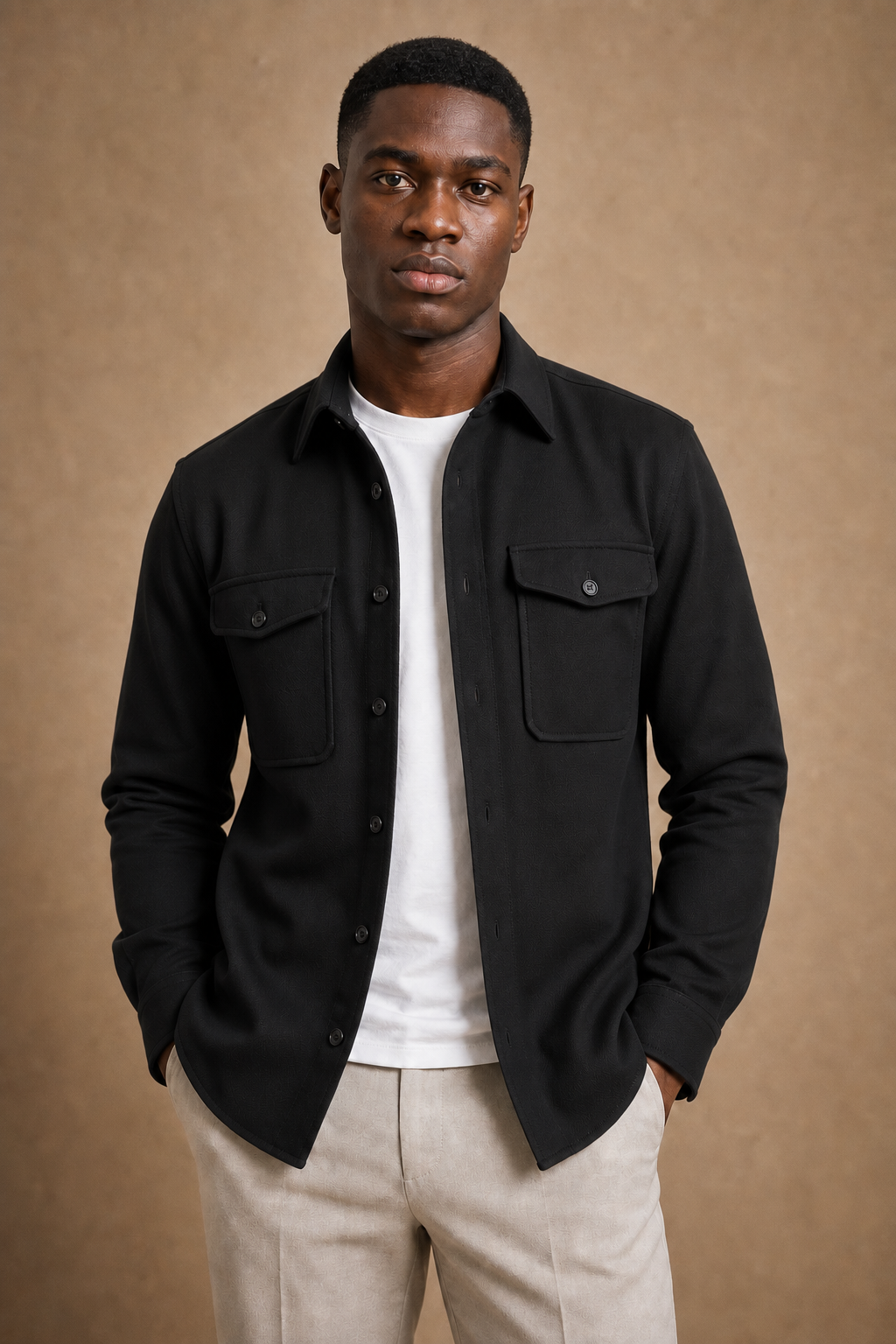 The Adige Overshirt in Black on model — front pose