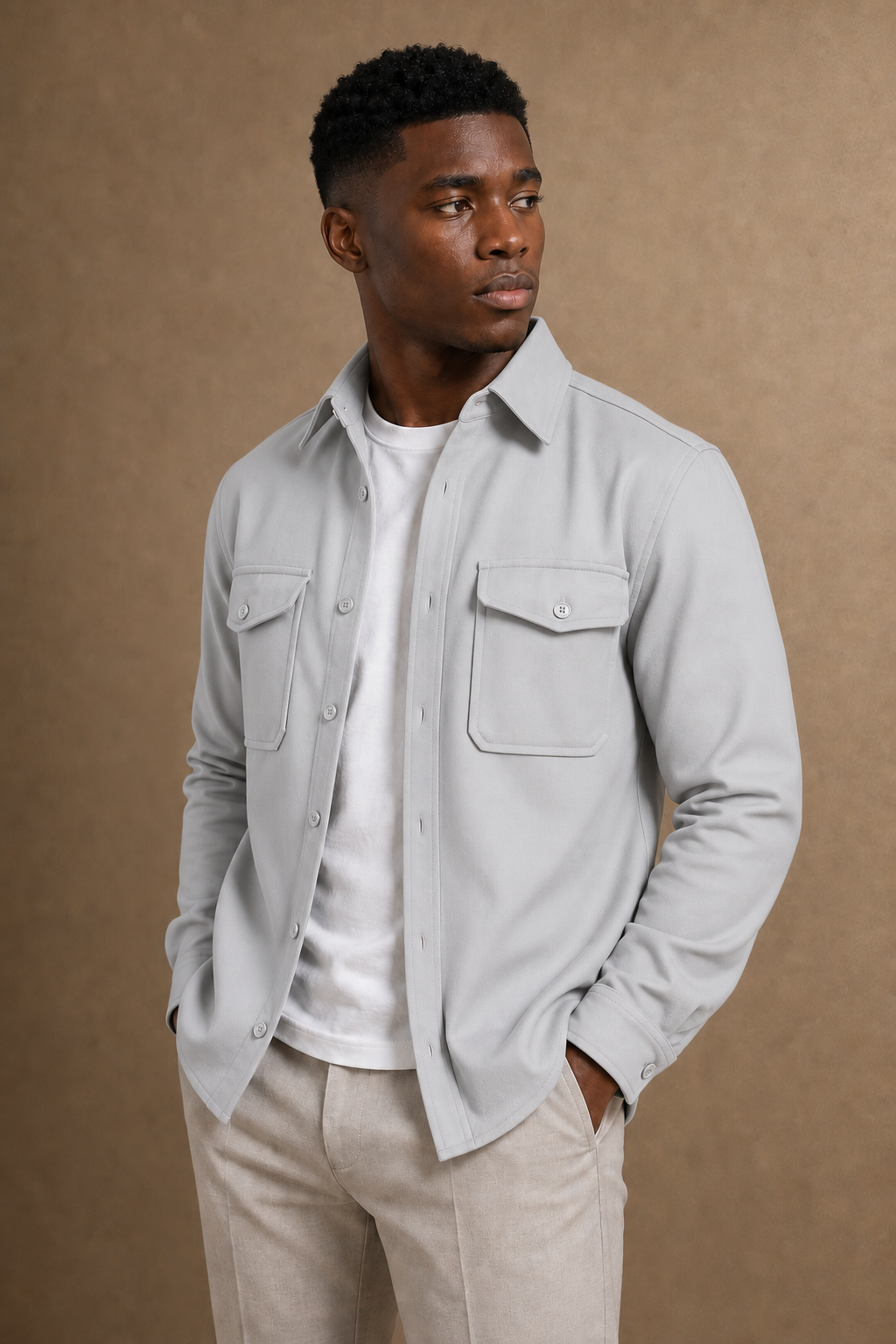 The Adige Overshirt in Light Grey on model — alternate pose