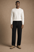 The Costa Pleated Pants in Black on model - front pose