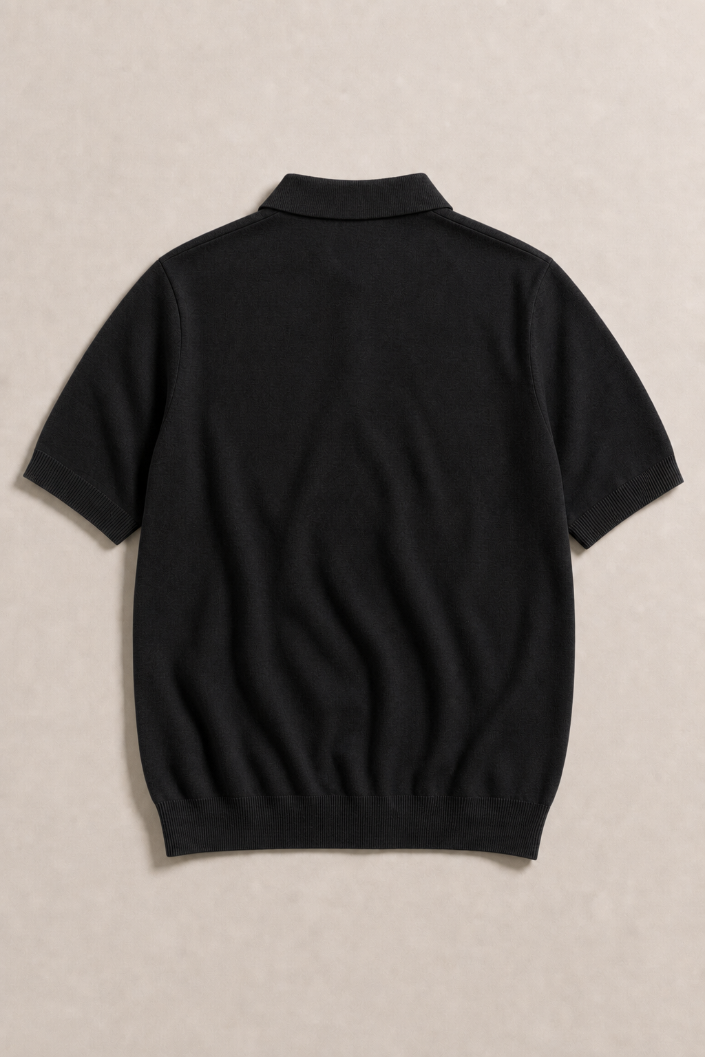 Torcello Knitted Polo Shirt in Black — back view