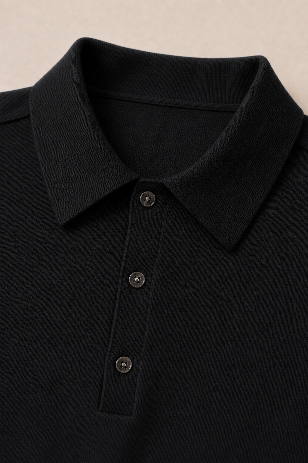 Torcello Knitted Polo Shirt in Black — fabric detail