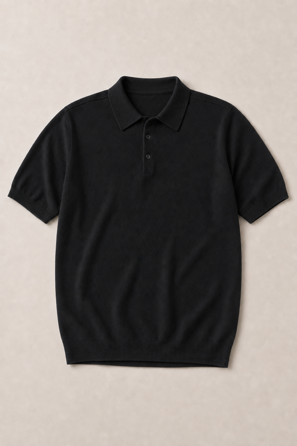 Torcello Knitted Polo Shirt in Black — front view