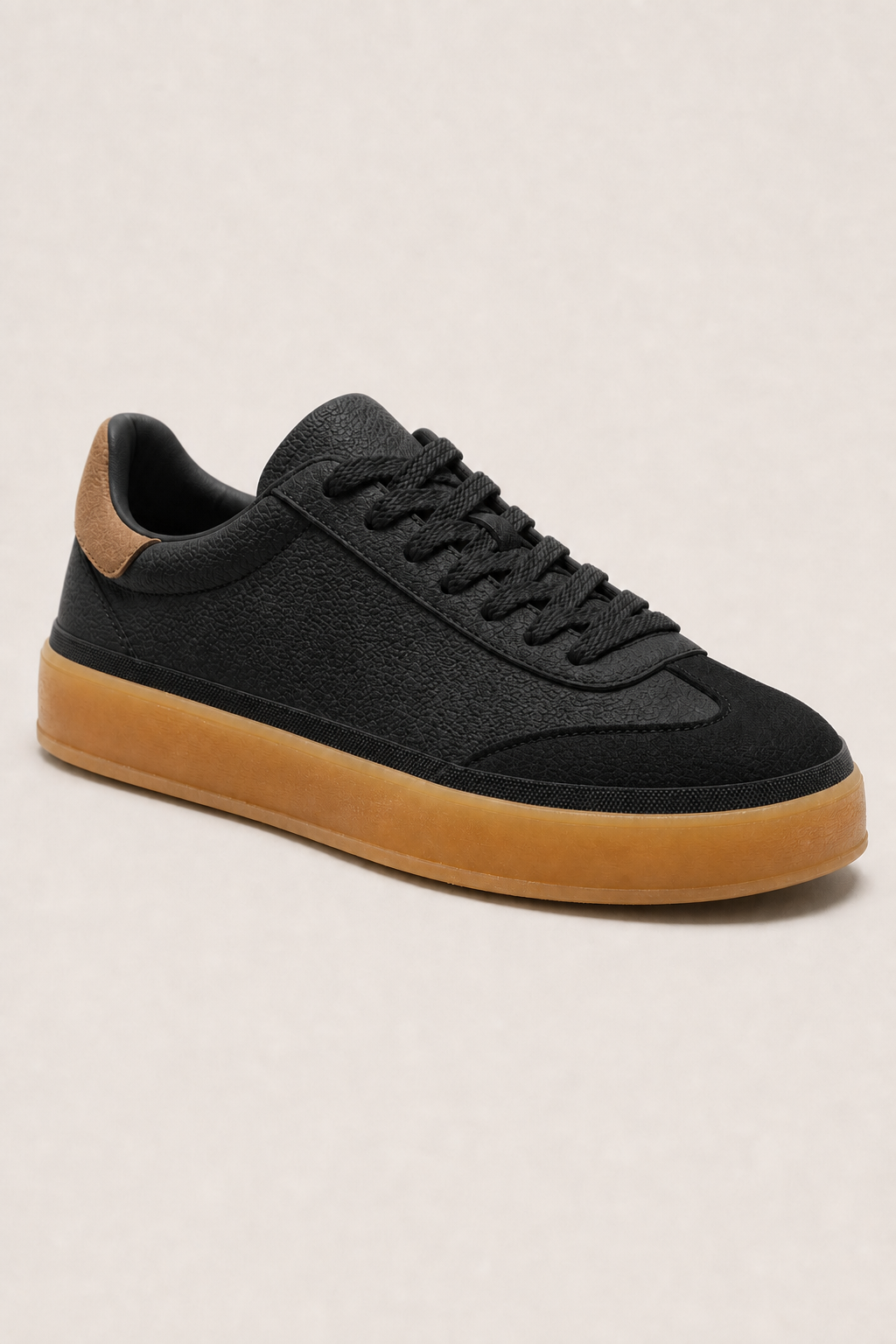 Vela Leather Sneakers in Black - angle view