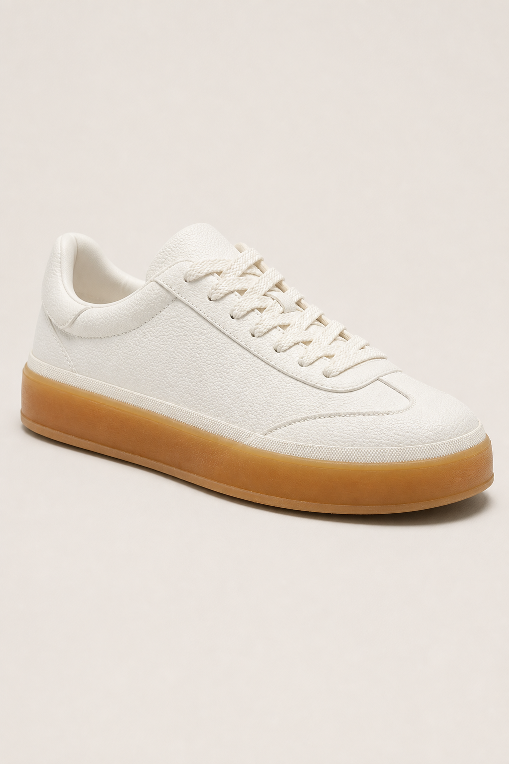 Vela Leather Sneakers in Cream - angle view